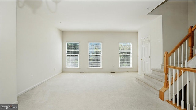 28 Buttonwood Ct, Baltimore, MD 21237 - foyer entrance featuring stairs and carpet floors