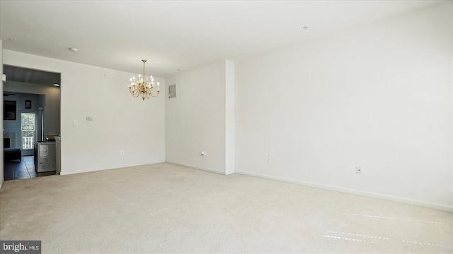 28 Buttonwood Ct, Baltimore, MD 21237 - unfurnished room featuring a chandelier and carpet