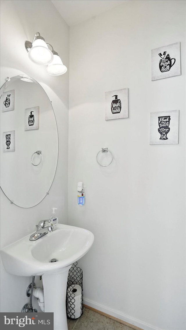 28 Buttonwood Ct, Baltimore, MD 21237 - bathroom with baseboards