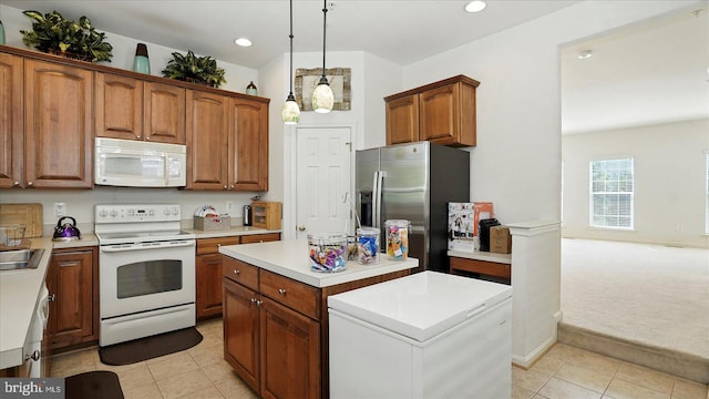 28 Buttonwood Ct, Baltimore, MD 21237 - kitchen with white appliances, light tile patterned flooring, a kitchen island, recessed lighting, and light countertops