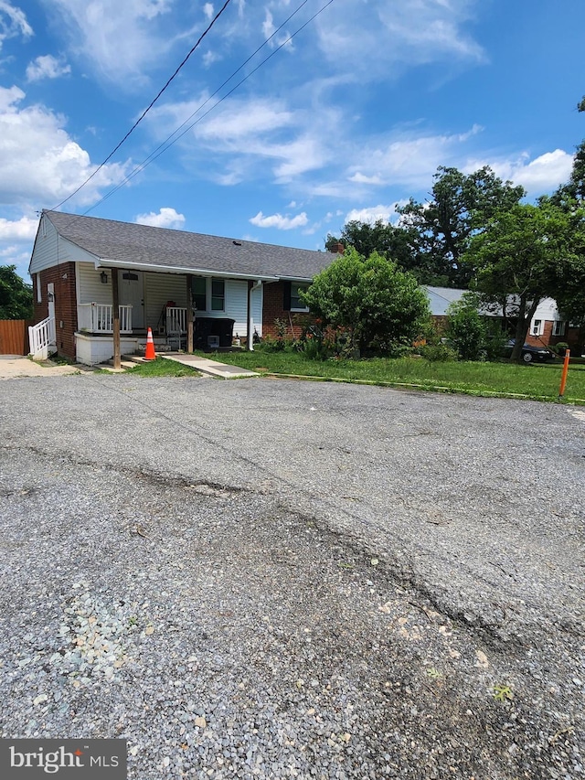 5503 Lanham Station Rd, Lanham, MD 20706 - ranch-style house featuring covered porch and brick siding