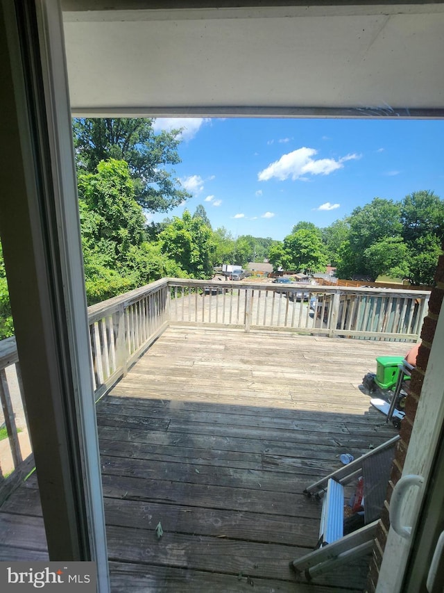 5503 Lanham Station Rd, Lanham, MD 20706 - wooden terrace featuring view of scattered trees