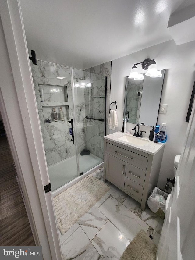 5503 Lanham Station Rd, Lanham, MD 20706 - bathroom with a marble finish shower, vanity, and marble finish floors