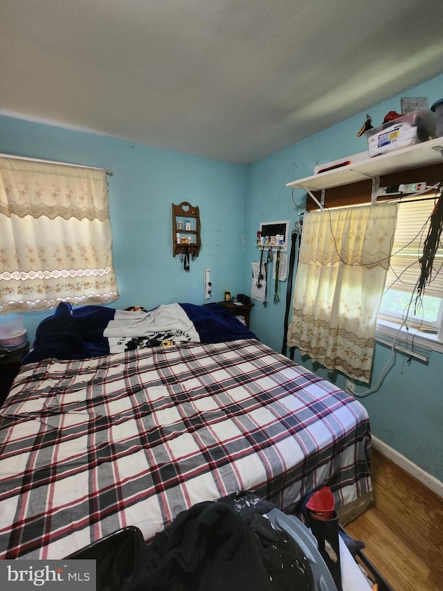 5503 Lanham Station Rd, Lanham, MD 20706 - bedroom featuring wood finished floors and baseboards