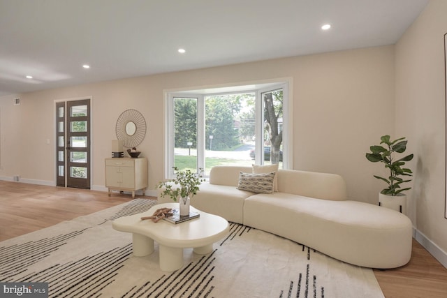 8328 Tuckerman Ln, Potomac, MD 20854 - living area with wood finished floors and recessed lighting