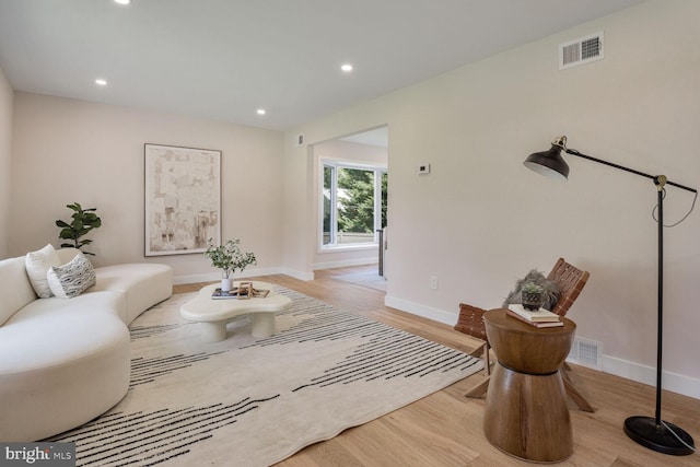 8328 Tuckerman Ln, Potomac, MD 20854 - living room with wood finished floors and recessed lighting