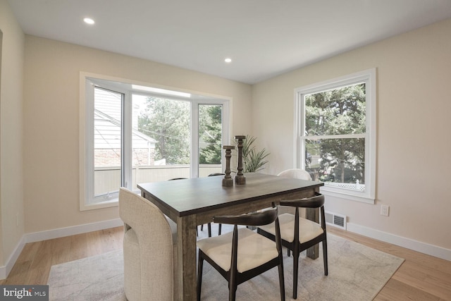 8328 Tuckerman Ln, Potomac, MD 20854 - dining space featuring plenty of natural light, light wood finished floors, and recessed lighting