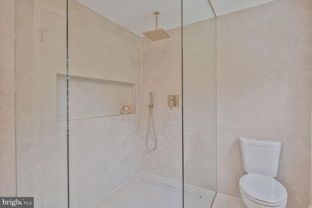 8328 Tuckerman Ln, Potomac, MD 20854 - bathroom featuring walk in shower and tile walls