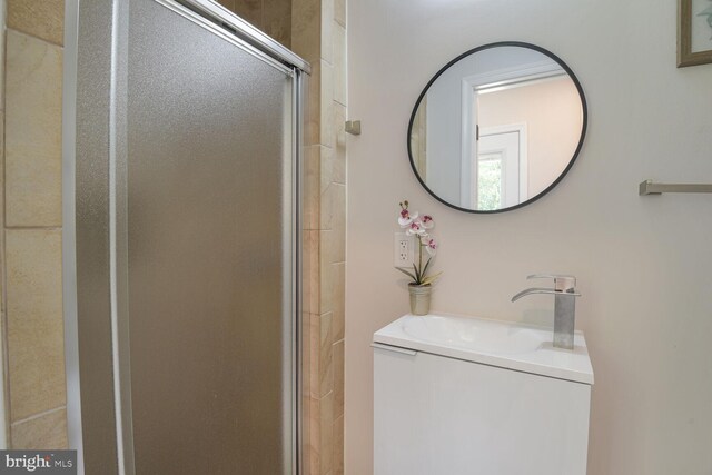 8328 Tuckerman Ln, Potomac, MD 20854 - bathroom with a shower stall and vanity