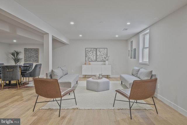 8328 Tuckerman Ln, Potomac, MD 20854 - living room featuring light wood-style flooring and recessed lighting