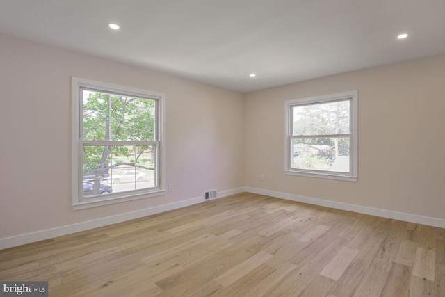 8328 Tuckerman Ln, Potomac, MD 20854 - spare room with light wood-type flooring and recessed lighting