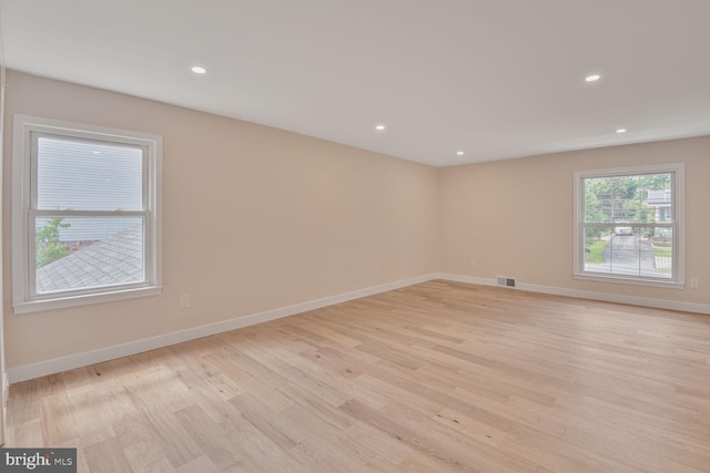 8328 Tuckerman Ln, Potomac, MD 20854 - spare room with light wood finished floors and recessed lighting