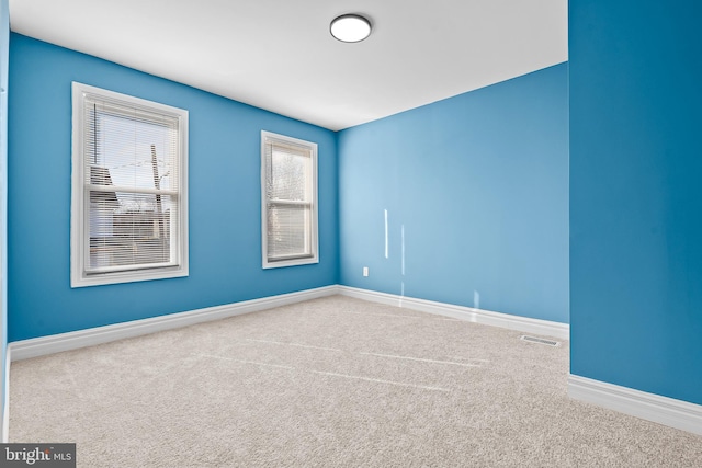 5309 Ethelbert Ave, Baltimore, MD 21215 - empty room featuring carpet and baseboards