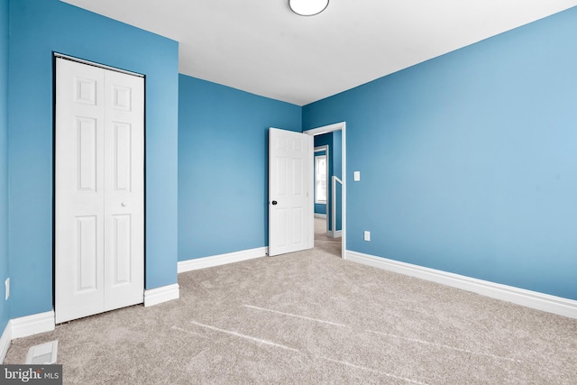 5309 Ethelbert Ave, Baltimore, MD 21215 - unfurnished bedroom with carpet flooring and a closet