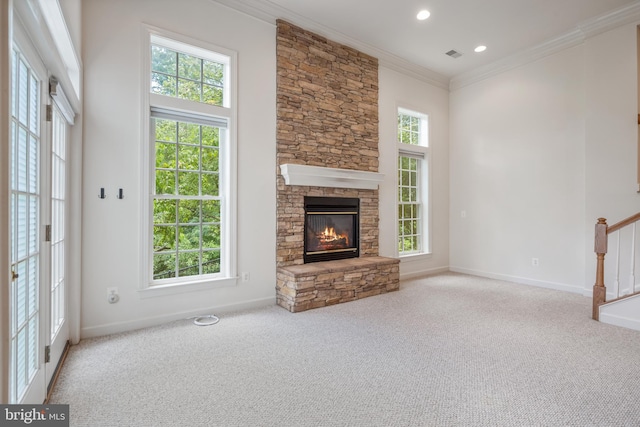 5617 James Gunnell Ln, Alexandria, VA 22310 - unfurnished living room featuring crown molding, carpet floors, a stone fireplace, stairs, and recessed lighting