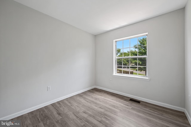 5783 Katsura Ct, Frederick, MD 21703 - unfurnished room featuring baseboards and wood finished floors