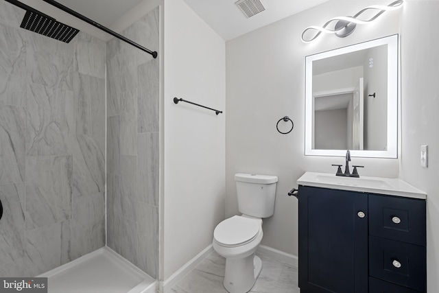 5783 Katsura Ct, Frederick, MD 21703 - bathroom featuring marble finish floors, vanity, and a tile shower