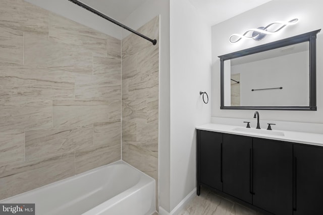 5783 Katsura Ct, Frederick, MD 21703 - bathroom featuring vanity, marble finish floors, and  shower combination