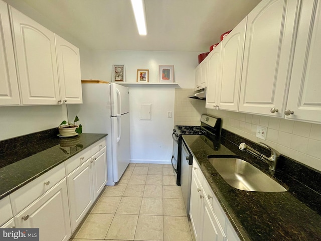 12207 Academy Way Unit 149 7, Rockville, MD 20852 - kitchen with under cabinet range hood, white cabinetry, tasteful backsplash, light tile patterned floors, and dark stone countertops