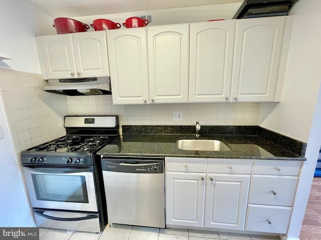 12207 Academy Way Unit 149 7, Rockville, MD 20852 - kitchen with appliances with stainless steel finishes, under cabinet range hood, white cabinetry, and dark stone counters