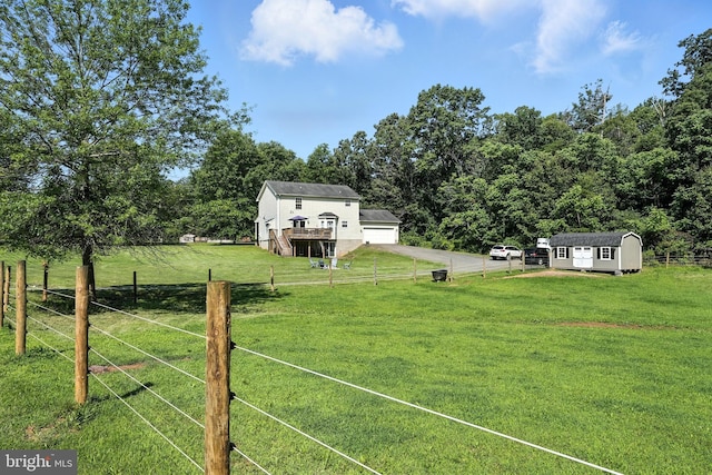5302 Sumerduck Rd, Sumerduck, VA 22742 - view of yard with a storage unit, a view of countryside, and a garage