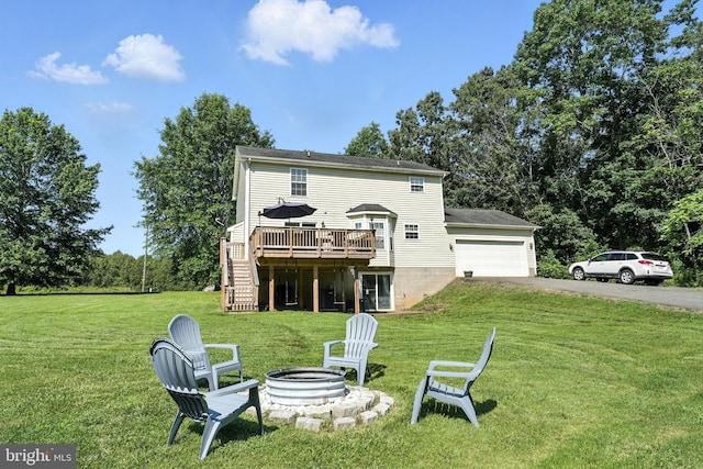 5302 Sumerduck Rd, Sumerduck, VA 22742 - back of property featuring a fire pit, driveway, a wooden deck, stairs, and an attached garage