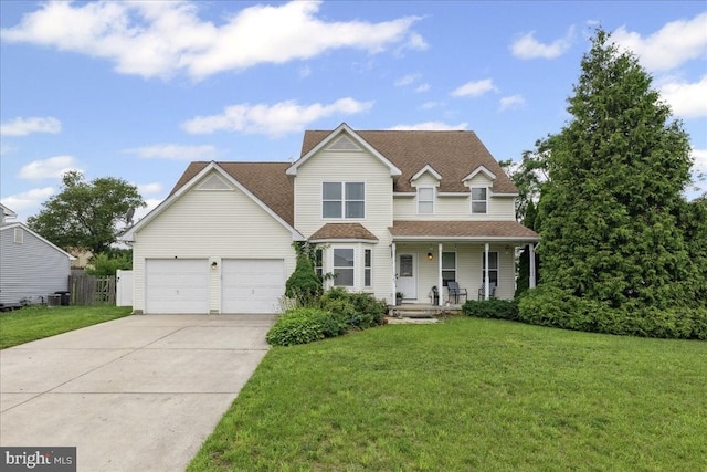 45 Sassafras Dr, Sicklerville, NJ 08081 - traditional home with a porch, concrete driveway, an attached garage, and roof with shingles