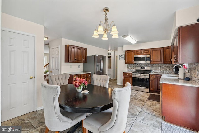45 Sassafras Dr, Sicklerville, NJ 08081 - dining area with a chandelier