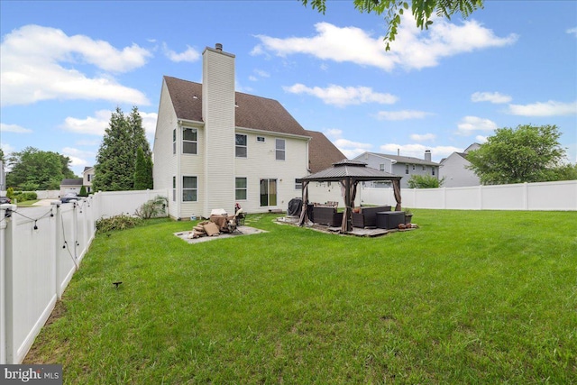 45 Sassafras Dr, Sicklerville, NJ 08081 - rear view of property with an outdoor hangout area, a gazebo, a chimney, a fenced backyard, and a patio