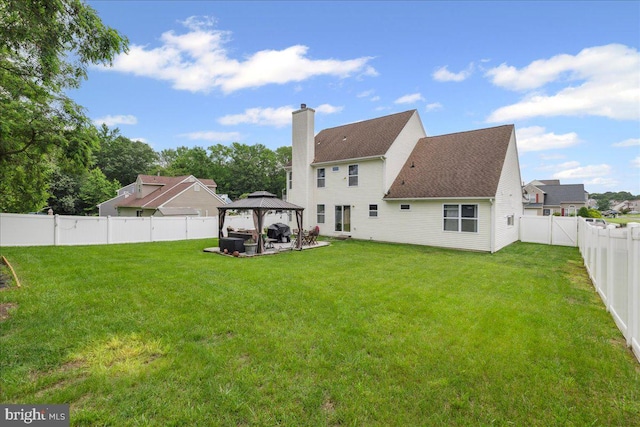 45 Sassafras Dr, Sicklerville, NJ 08081 - rear view of house with a gazebo, a chimney, a patio area, and a fenced backyard