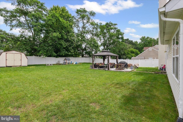 45 Sassafras Dr, Sicklerville, NJ 08081 - fenced backyard with a gazebo, a storage unit, a patio area, and an outdoor living space