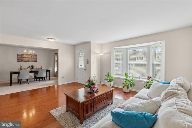 45 Sassafras Dr, Sicklerville, NJ 08081 - living area featuring a chandelier, healthy amount of natural light, and wood finished floors