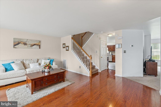 45 Sassafras Dr, Sicklerville, NJ 08081 - living area featuring wood finished floors and stairway