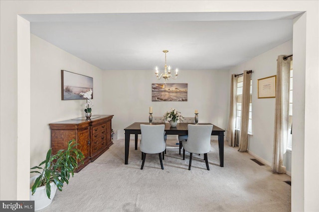 45 Sassafras Dr, Sicklerville, NJ 08081 - dining room with light carpet and a chandelier