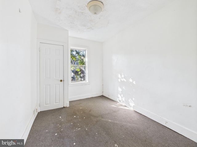 5219 Beaumont Ave, Philadelphia, PA 19143 - spare room with baseboards and carpet