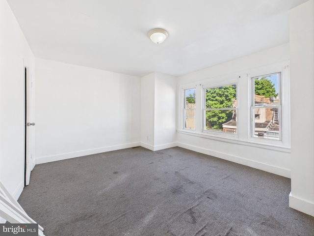 5219 Beaumont Ave, Philadelphia, PA 19143 - unfurnished room featuring carpet floors and baseboards