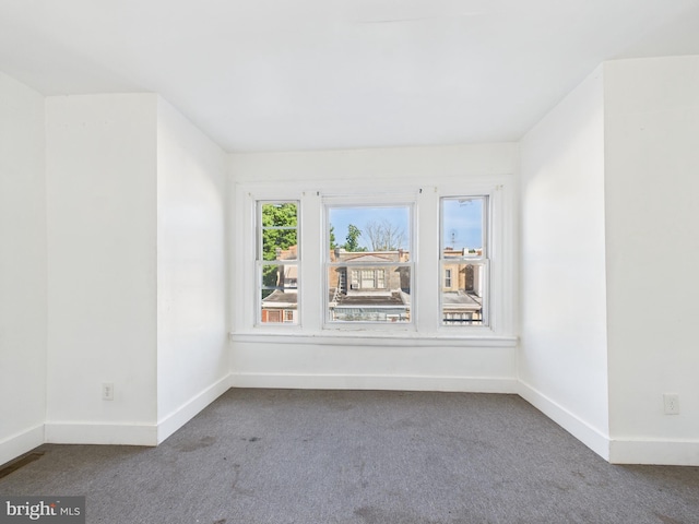 5219 Beaumont Ave, Philadelphia, PA 19143 - carpeted spare room with baseboards