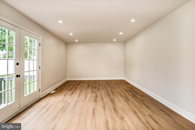 22 Billingsport Dr, Sicklerville, NJ 08081 - spare room featuring french doors, light wood-type flooring, and recessed lighting