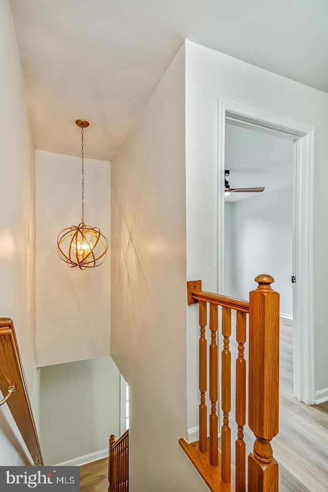 22 Billingsport Dr, Sicklerville, NJ 08081 - staircase with wood finished floors and a chandelier