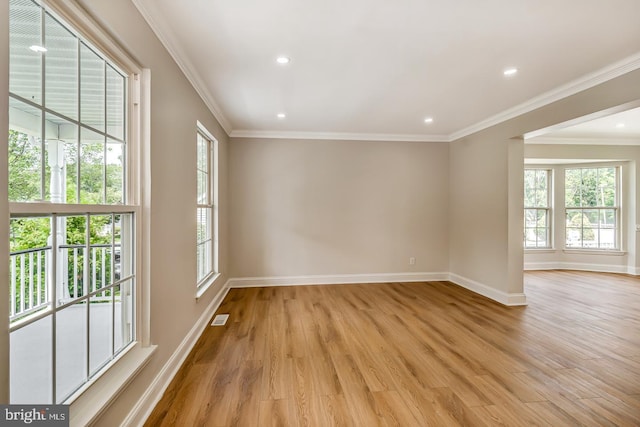22 Billingsport Dr, Sicklerville, NJ 08081 - spare room featuring light wood finished floors, healthy amount of natural light, ornamental molding, and recessed lighting