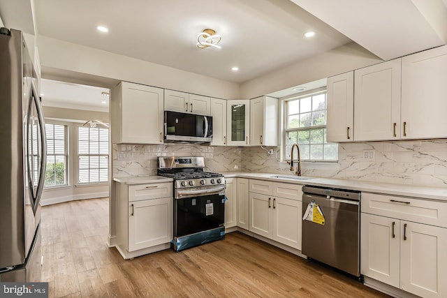 22 Billingsport Dr, Sicklerville, NJ 08081 - kitchen featuring stainless steel appliances, light wood-style flooring, white cabinets, and recessed lighting