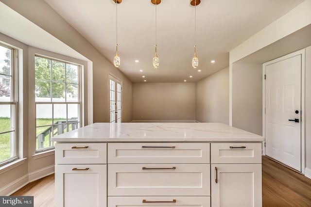 22 Billingsport Dr, Sicklerville, NJ 08081 - kitchen featuring light wood-style floors, light stone counters, healthy amount of natural light, and recessed lighting