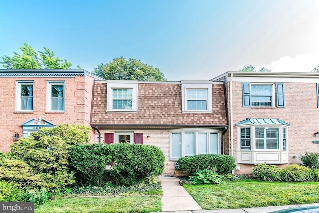 6611 Rosecroft Pl, Falls Church, VA 22043 - view of front of home featuring mansard roof, a shingled roof, and brick siding