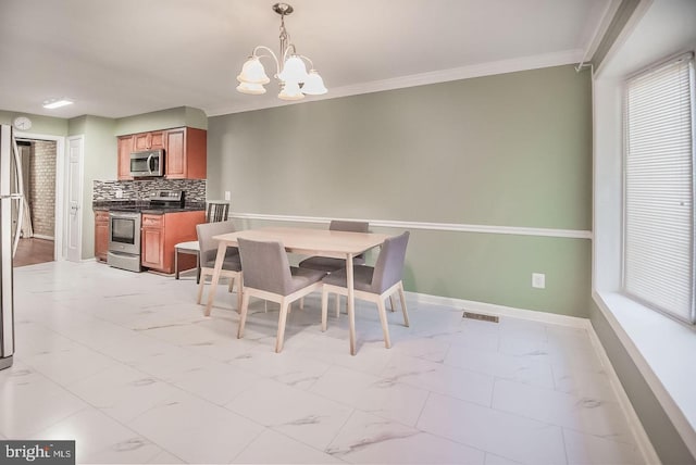 6611 Rosecroft Pl, Falls Church, VA 22043 - dining area with a chandelier, light marble finish flooring, and ornamental molding