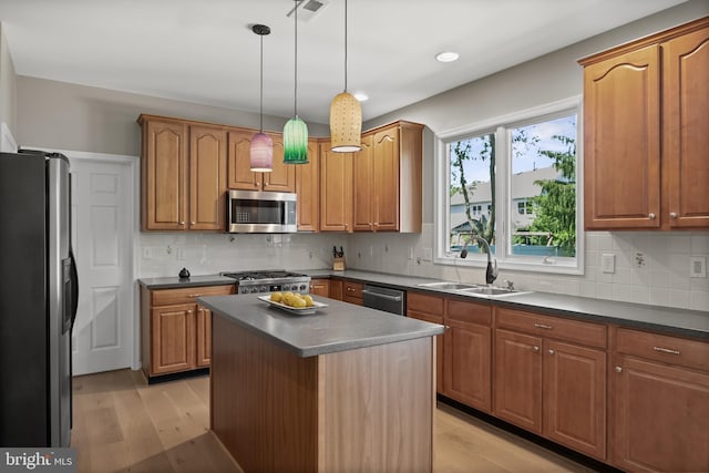 62 Brooks Rd, Moorestown, NJ 08057 - kitchen featuring stainless steel appliances, dark countertops, light wood finished floors, backsplash, and recessed lighting