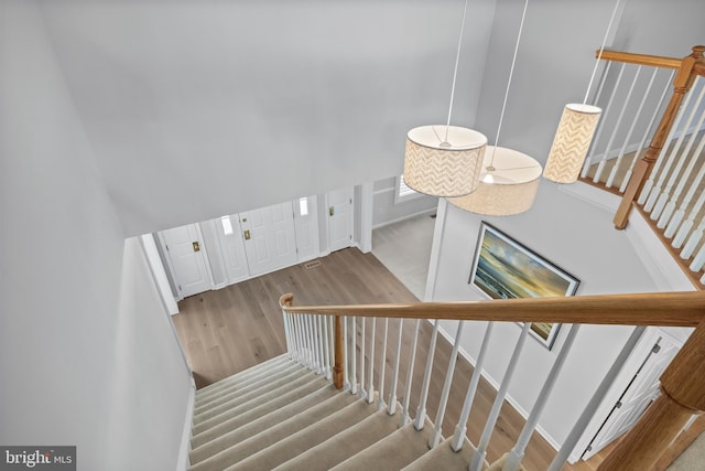 62 Brooks Rd, Moorestown, NJ 08057 - stairway featuring wood finished floors