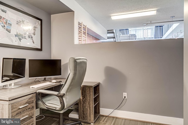 1390 Kenyon St NW Unit 326, Washington, DC 20010 - office space featuring wood finished floors and a textured ceiling