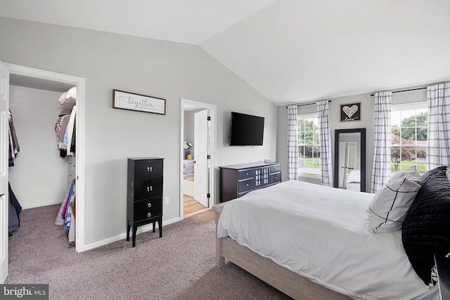 107 Heathfield Ct, Middletown, DE 19709 - bedroom with lofted ceiling, a walk in closet, carpet, and ensuite bathroom