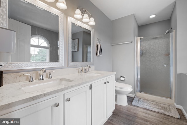 107 Heathfield Ct, Middletown, DE 19709 - full bathroom with a shower stall, double vanity, and wood finished floors