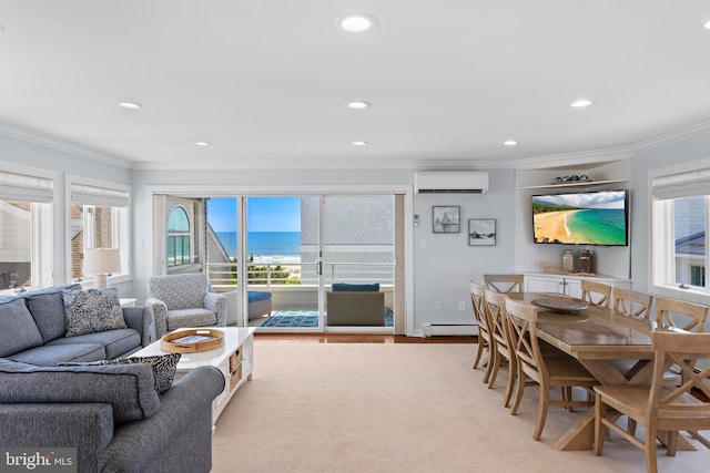 10 11th St, Beach Haven, NJ 08008 - living area featuring a wall mounted AC, ornamental molding, recessed lighting, wood finished floors, and a baseboard radiator